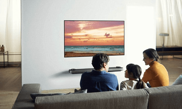 Family watching TV